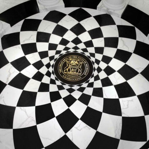 detail of a black and white carrara marble floor