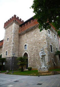 outside view of the malaspina castle, academy of fine arts in carrara