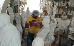 Local marble sculptor working in Carrara sculpture studio