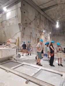Shore excursion to Carrara marble quarries – underground excavation site with marble walls